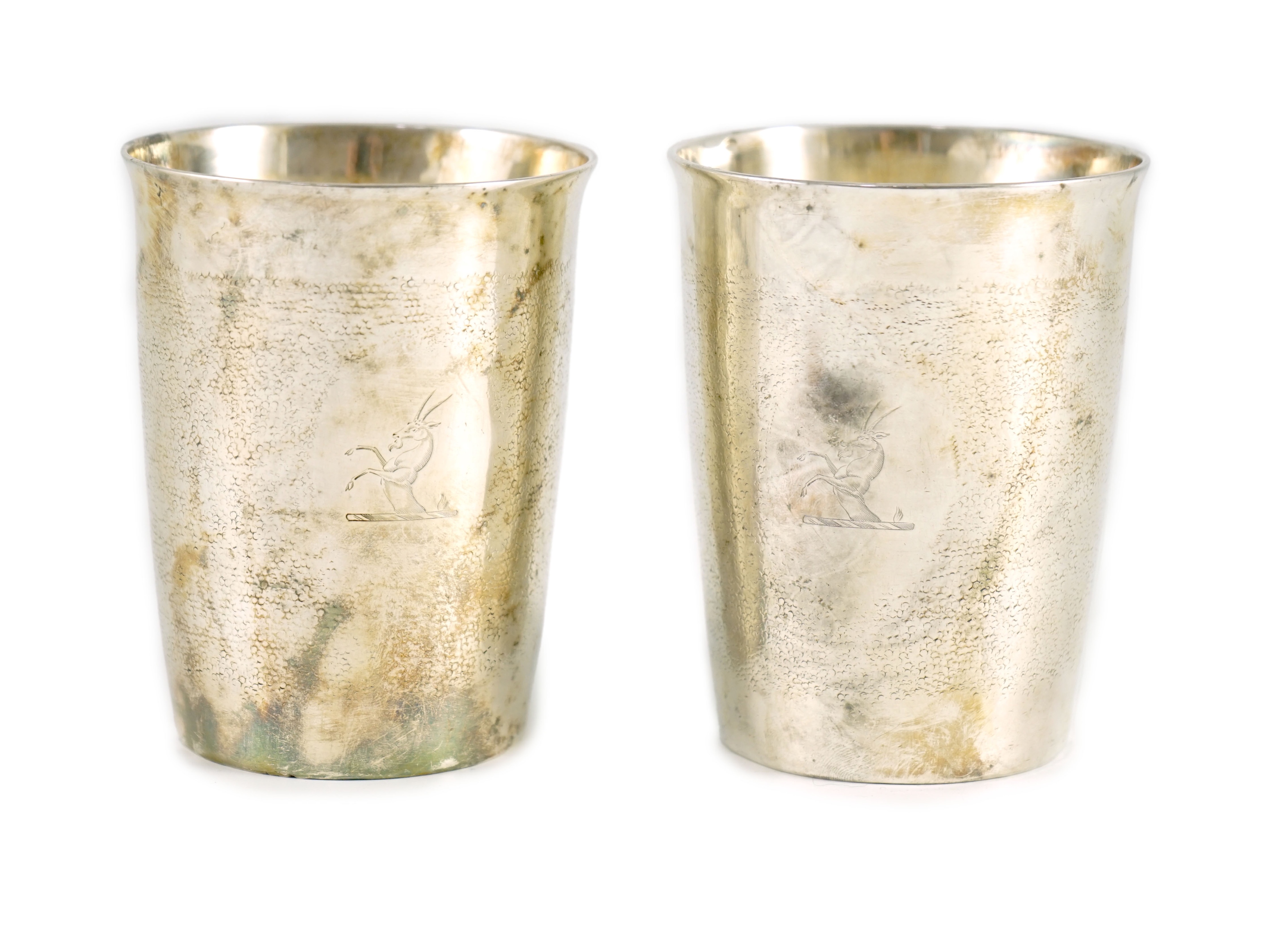 A pair of George III part textured silver beakers, by Henry Chawner